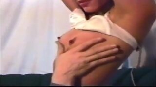 Smacking her voluptuous vintage curves