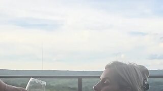 I deepthroat this big cock on the balcony outside for all to see