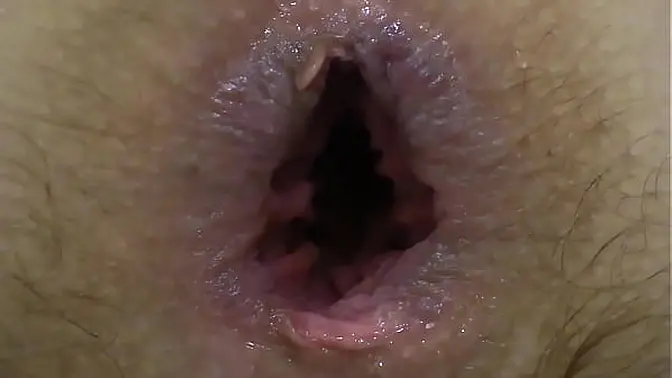 A brunette with a big dildo fucks her anal and stretches the anus and shows beautiful booty in different positions Then she masturbates her hairy cunt