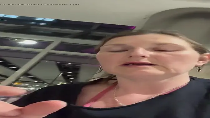 Airline stewardess flashes her perky boobs at airport