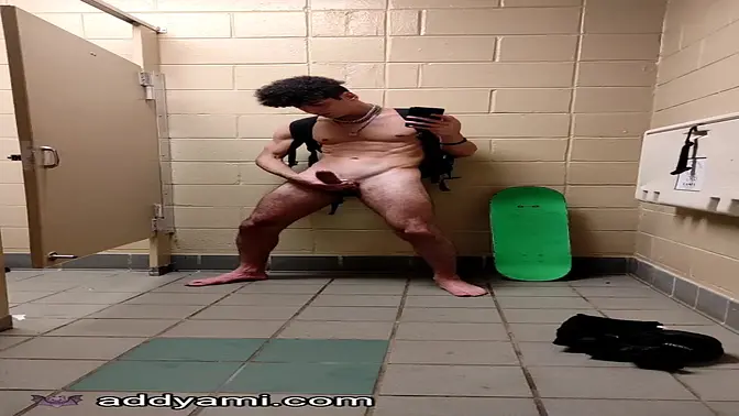 Amateur hot boy jacks off in college bathroom