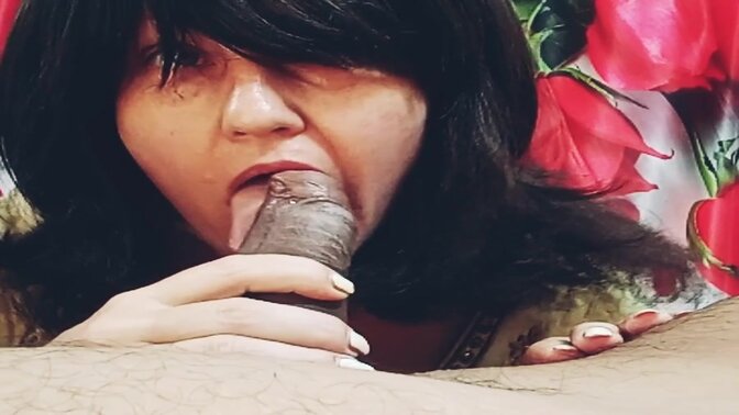 Amateur housewife takes it all in stride, giving a sloppy blowjob, footjob