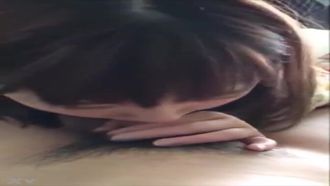 Amateur Japanese girl gives a deepthroat blowjob