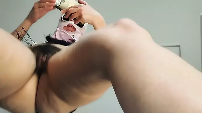 Amateur MILF massages herself with a vibrator