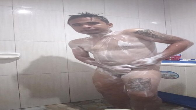 Asian Babe Shows Off in Shower Fountain