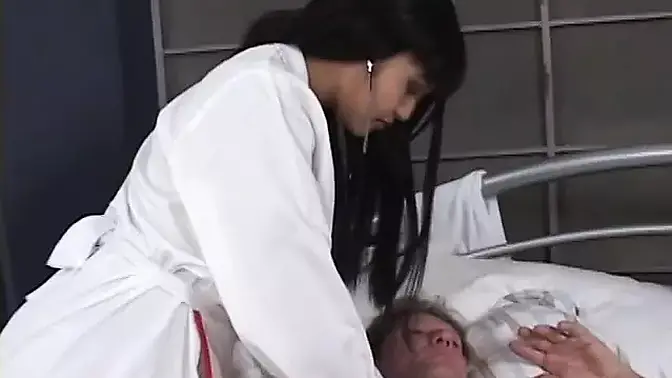 Asian nurse babe sucks and fucks in bed