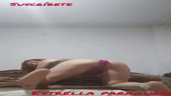 Beautiful Paraguayan woman masturbates with a vibrator in her ass while wearing sexy lingerie
