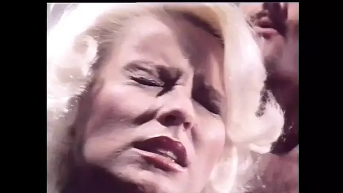 Big-Titted Euro Babe Teases and Plays with Her Massive Knockers