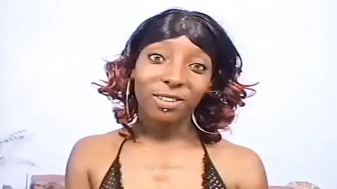 Black beauty blows white cock on vintage show