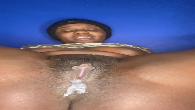 Black beauty rubs her creamy pole