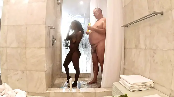 Black stud pounds hot ebony MILF in doggystyle shower session