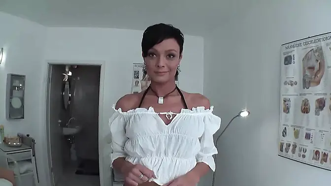 Blonde MILF gynecologist examines young girl