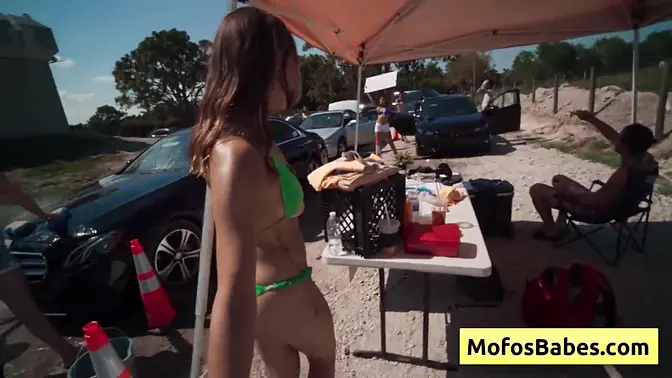 Blondie sucks huge cock at carwash fundraiser