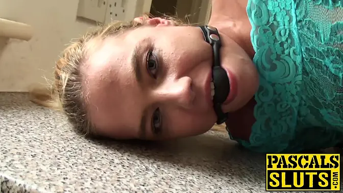 Bound British blonde takes a rough facial and gag ball