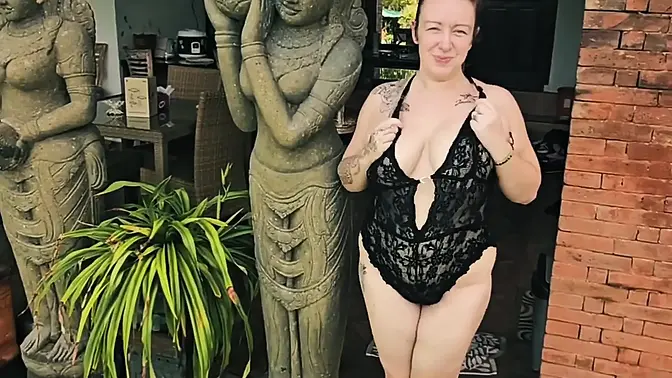 British mature MILF Jade plays with a big dildo in the shower