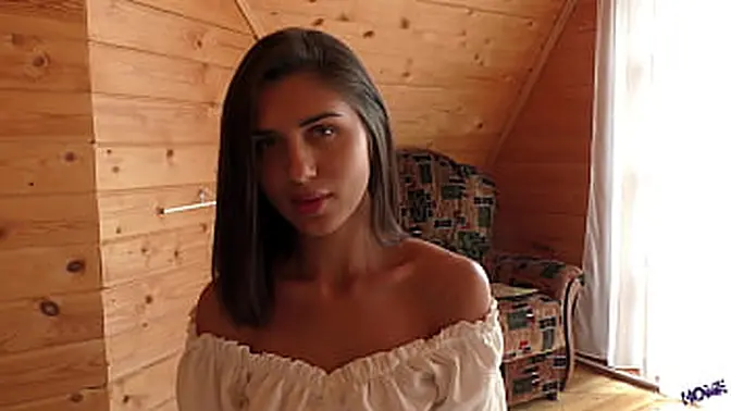 Brunette beauty gives a blowjob and takes a big cock