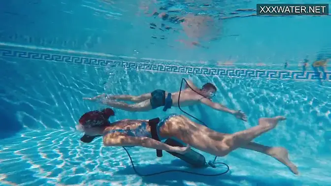 Brunette teen gives hot underwater blowjob