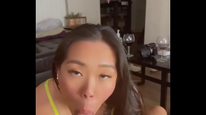 Busty Asian beauty deep-throats huge cock in lingerie POV