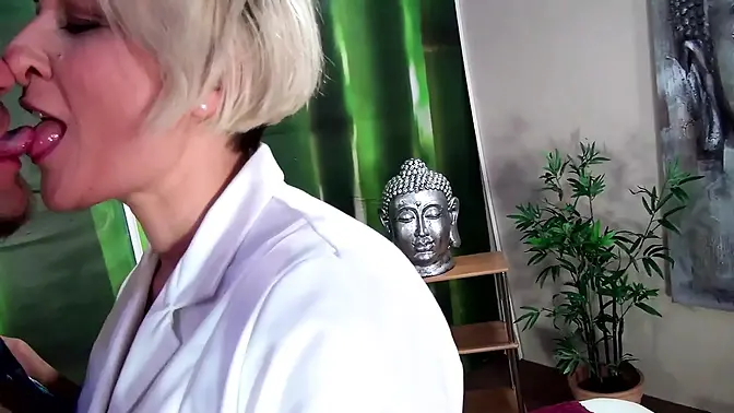 Busty blonde MILF casts massive cock and gives a deepthroat