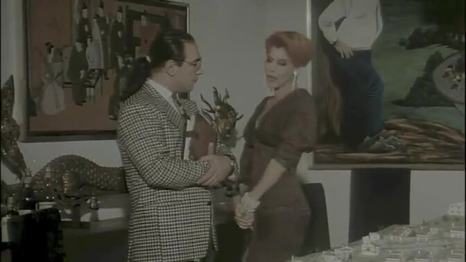 Busty blonde Milly gets assfucked on a table