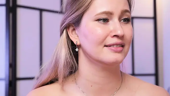 Busty girl spreads legs in sexy stockings