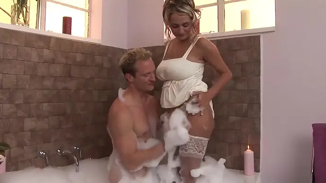 Busty goddess in white dress joins in Jacuzzi for wild lovemaking