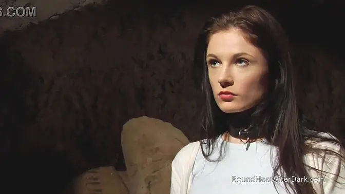 Busty lesbian slave moans as mistress punishes her with strap-on doggystyle