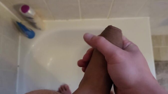 Chastity cage lover jerks off massive cock until he shoots