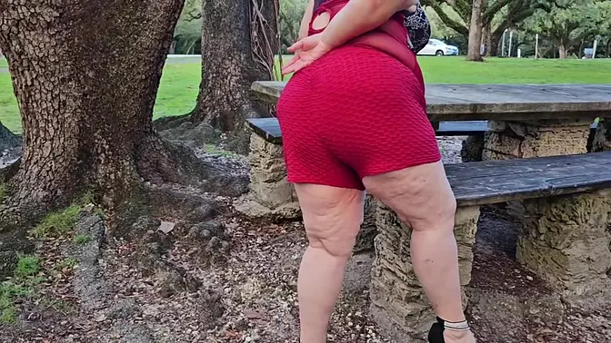 Chubby hijab MILF shows off big booty and pees during walk