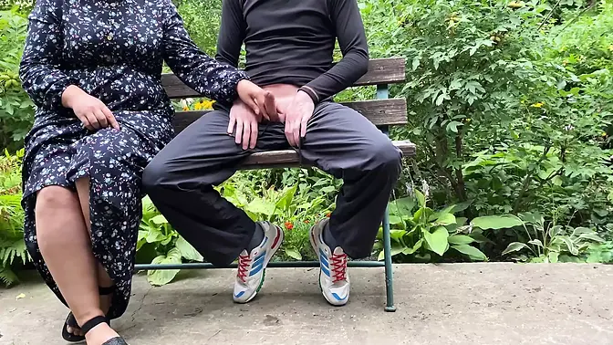 Curvy MILF's public handjob makes me cum in a condom