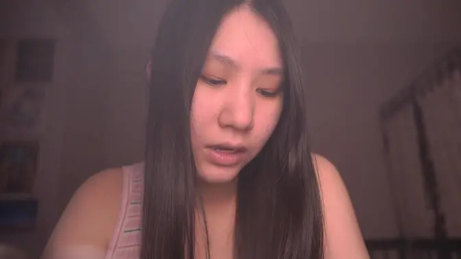 Cute Asian girl reads stories and masturbates