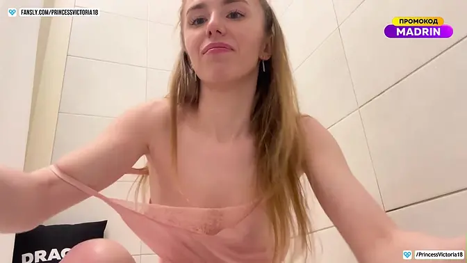 Cute Redhead Slut Teases Her Pussy in the Bathroom