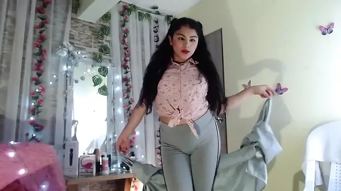 Cute virgin 18-year-old girl strips for the camera