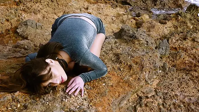 Dominatrix humiliates submissive with extreme anal play by the sea