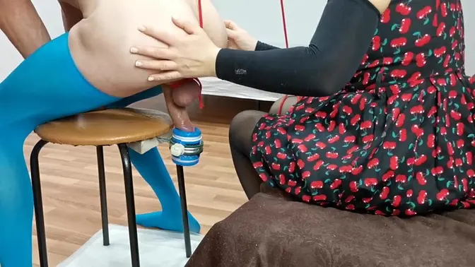 Dominatrix milks his cock through flashlight fuck