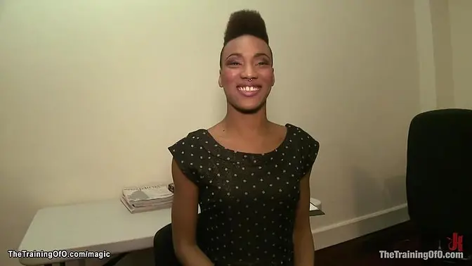 Ebony submissive squats on a dildo during training session