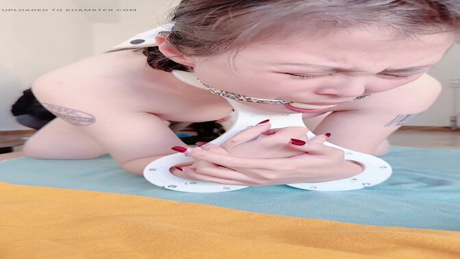 Electric Slave Doll Aaruna submits to foot worship