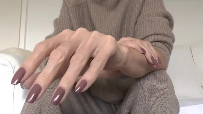 Elegant Lady Victoria Valente shows off beautiful hands in cashmere sweater