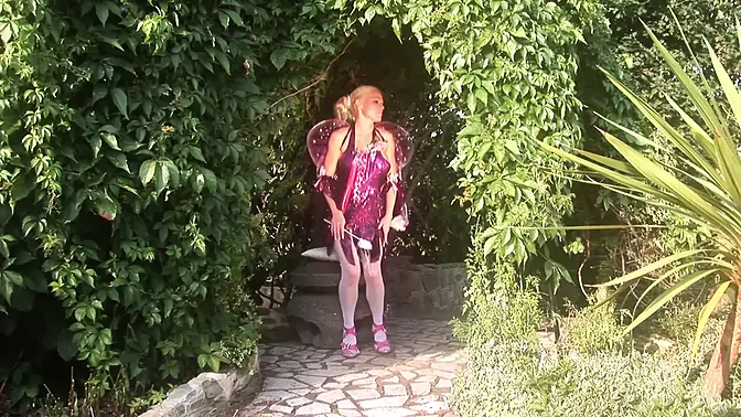 Fairy-costumed babe shares outdoor threesome with two studs