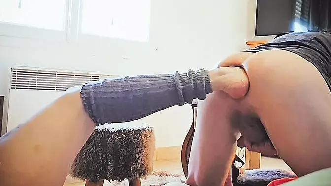 Feisty femdom fisting her feet into his ass