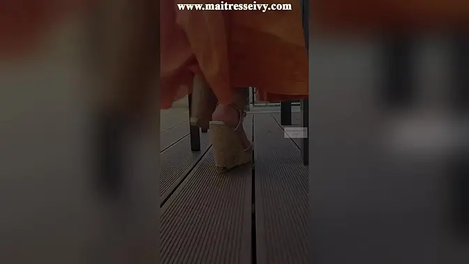 French Asian goddess ignores foot slave's worship on terrace