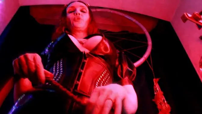 German MILF Eva in latex dominates with heels and boots