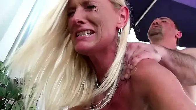 German MILF undresses and rides giant cock