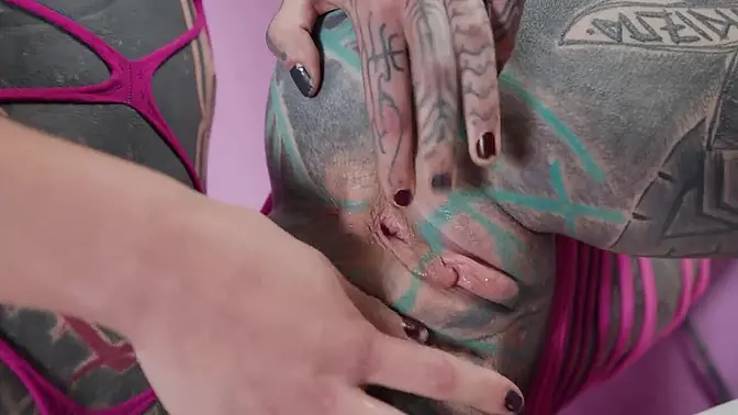 Gothic tattooed girl with nipple piercings goes hard with strapon