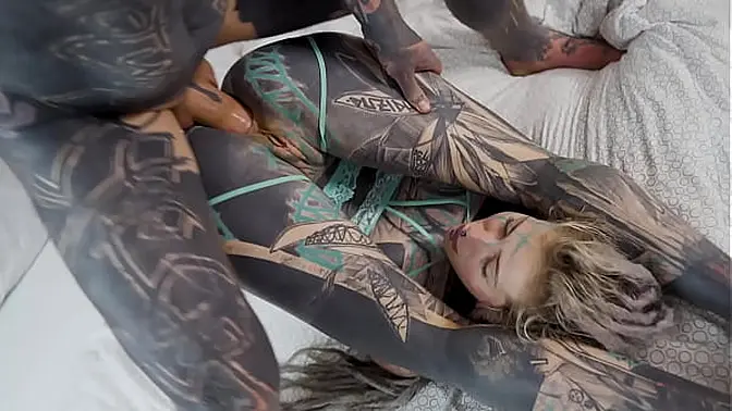 Heavily Tattooed Girl Sucks Cock & Rides Big Dick