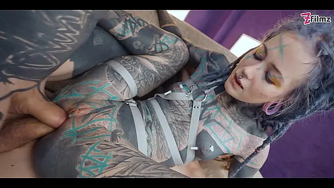 Heavy Inked Goth Slut swallows and gapes while her ass gets pounded