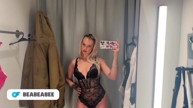 Hot blonde tries on see-through dresses in 4K transparency