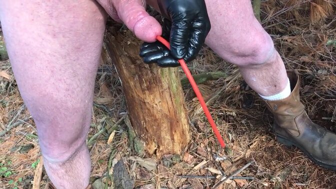 Hot nude girl pees with neon catheter outside