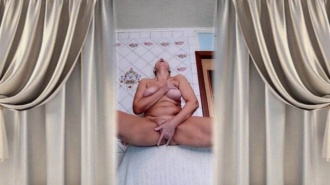 Hot older woman enjoys kitchen sex