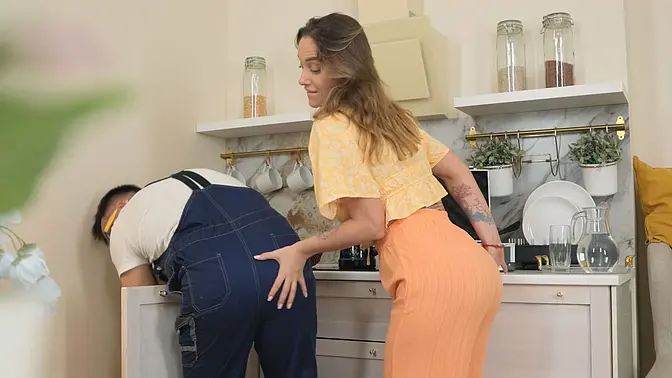 Hot tattooed MILF gets plowed by a plumber